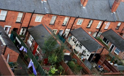 A high angle view of a row of houses

Description automatically generated
